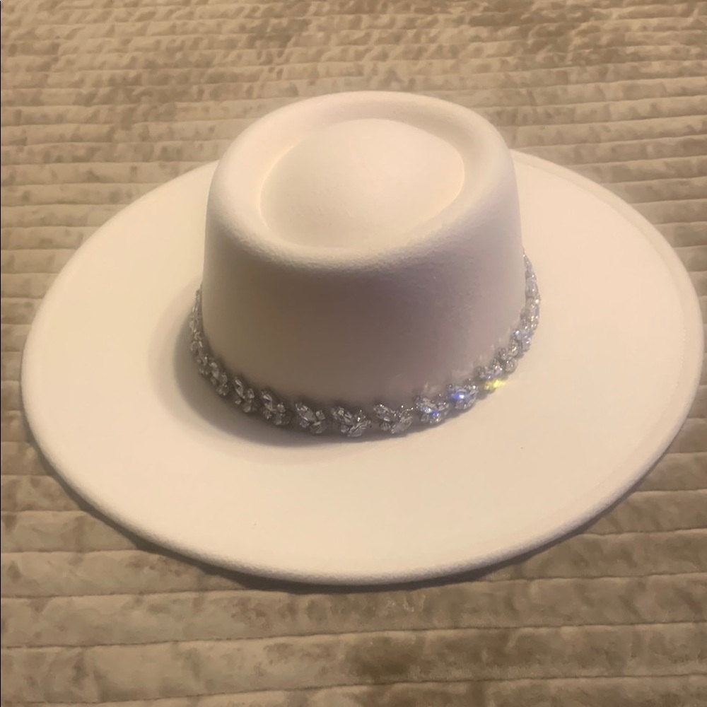 Elegant White Hat with Silver Embellishments